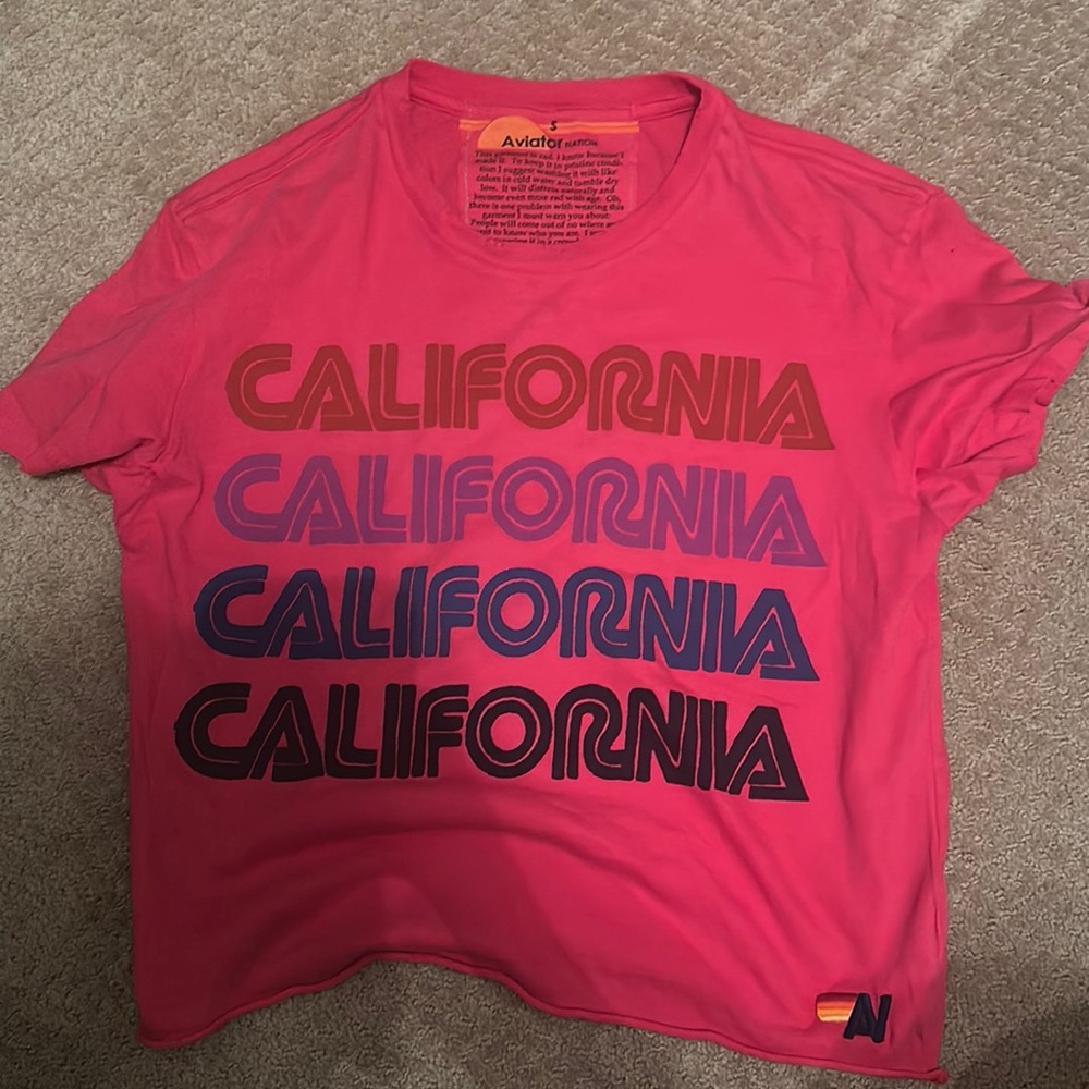 Women’s size small Aviator Nation tee shirt, in pink.